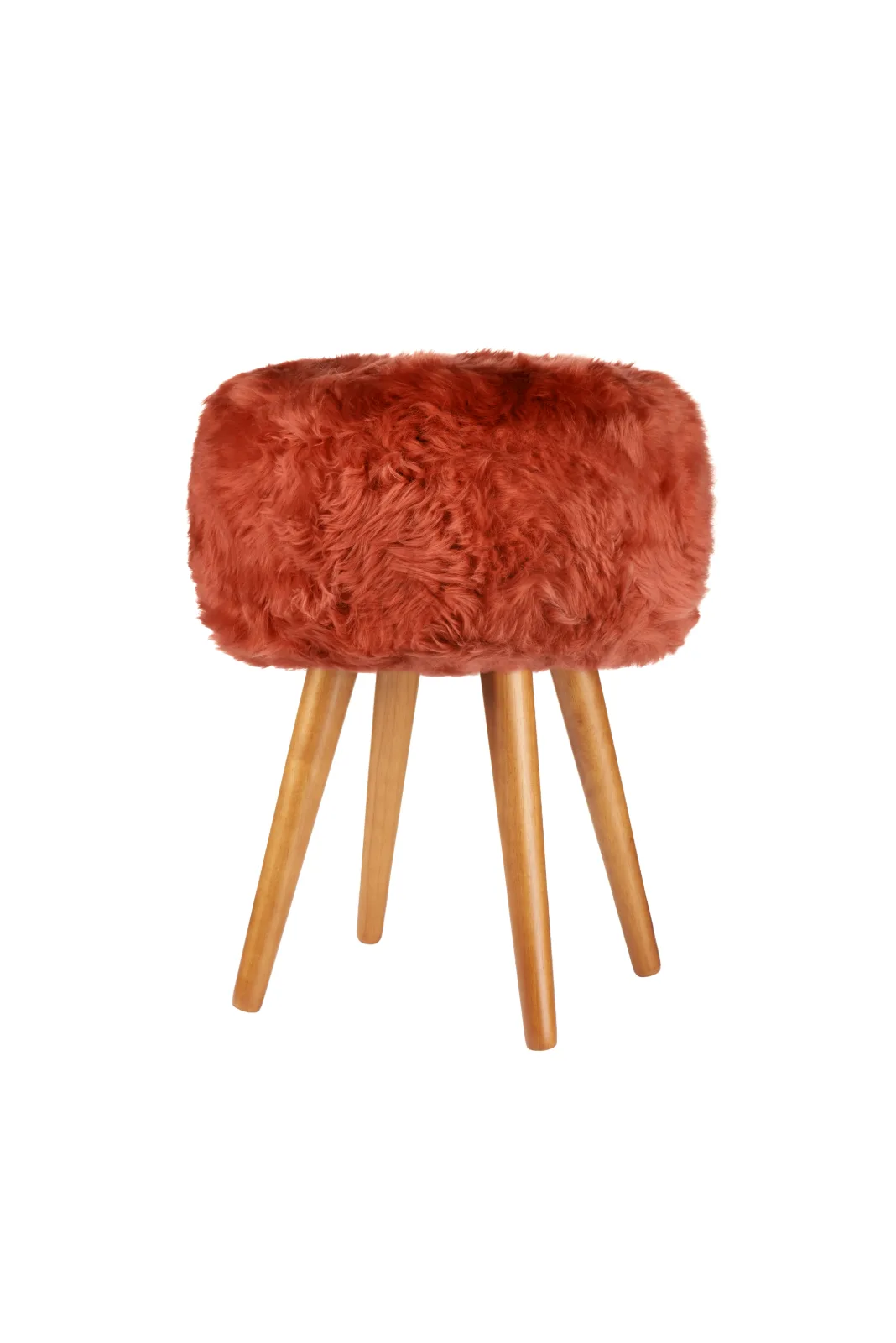 Burnt Orange genuine sheepskin stool showing all four oak legs on a white background