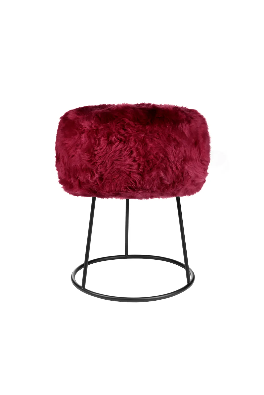 Fuchsia Pink genuine sheepskin stool showing the full black metal frame on a white background